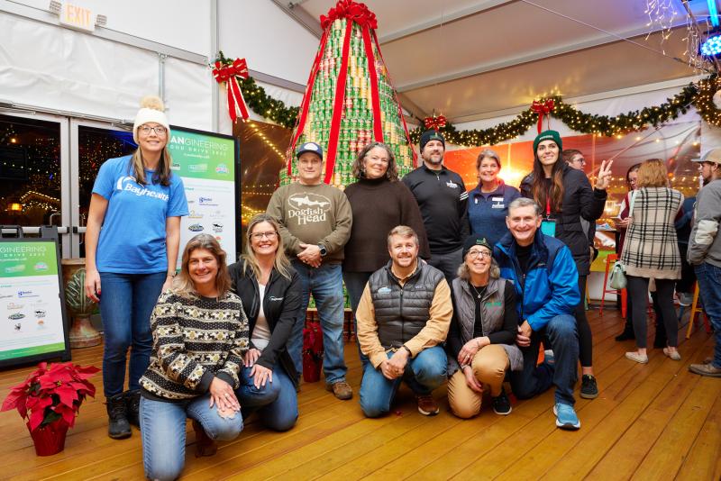 Project Kudos food drive participants shown are in back (l-r) Sarah Thomas, Bayhealth; Tony Milbut; Dogfish Head; Kathy McDonald, La Vida Hospitality; Larry Haas and Kathy Kanefsky, Food Bank of Delaware; and Adelina Riddick, Schell Brothers. In front are Alyssa Titus, Schell Brothers; Alice Rausch, Bayhealth; Keith "Toasty" Kirk, Starboard; and Susan Denardo and Steve Thompson; Food Bank of Delaware. SUBMITTED PHOTOS
